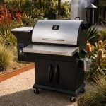 Z Grills 700E-XL pellet smoker in a native Australian garden